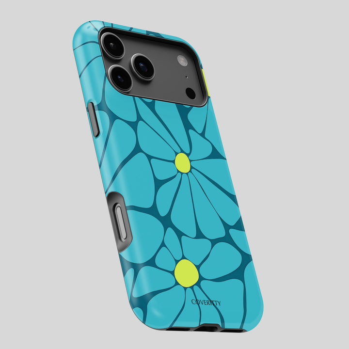 Blue floral phone case with green centers on a gray background