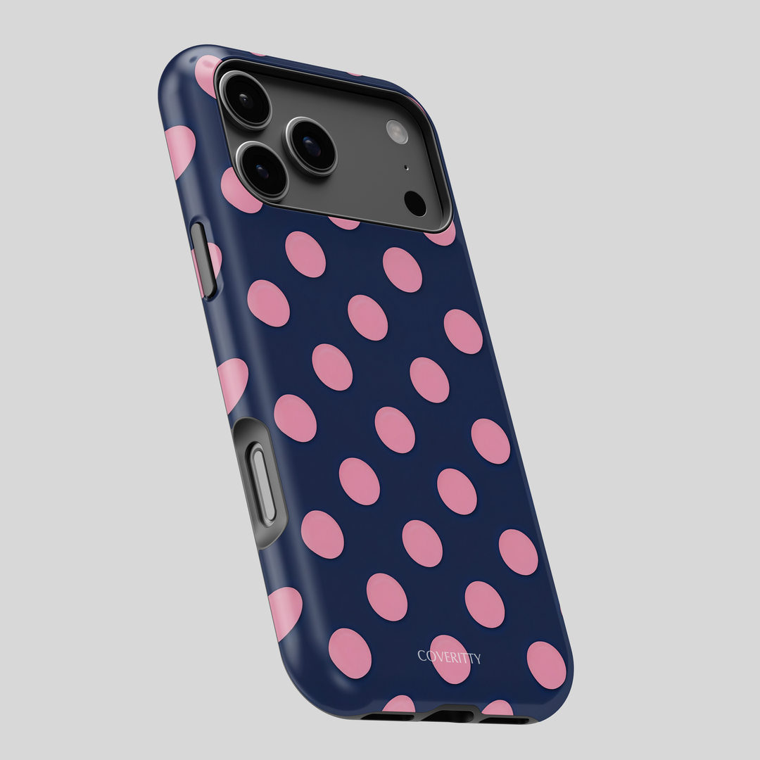Phone case with pink polka dots on a blue background