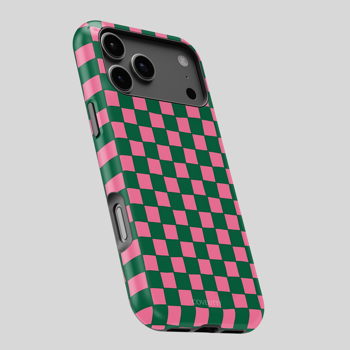 Phone case with green and pink checkered pattern on a gray background