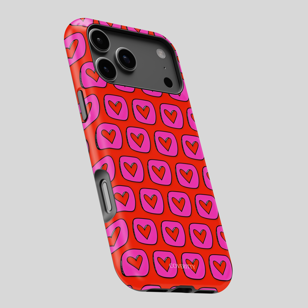Phone case with pink heart pattern on a red background