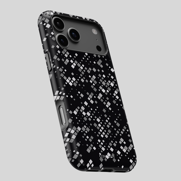 Phone case with black and white geometric pattern on a light gray background