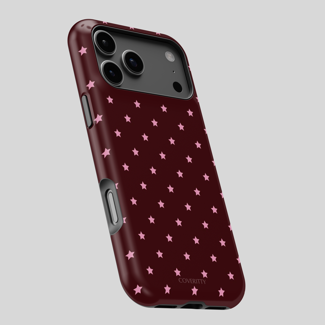 Phone case with pink star pattern on a gray background